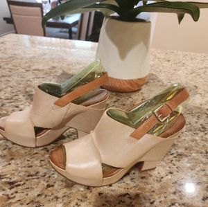 Naya Monroe: Open toe Man made Leather Slingback Platform Sandal.